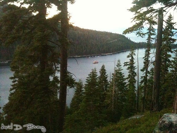 A paddleboat coming into Emerald Bay at sunset A paddleboat coming into Emerald Bay at sunset
